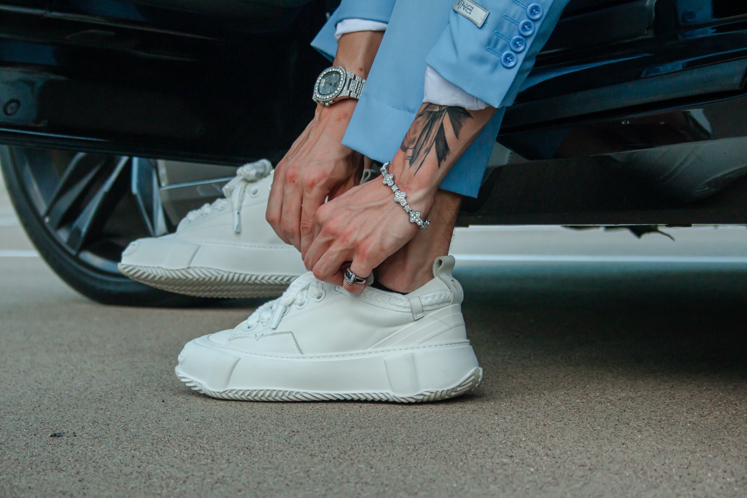 Detail portrait of white shoes and jewelry