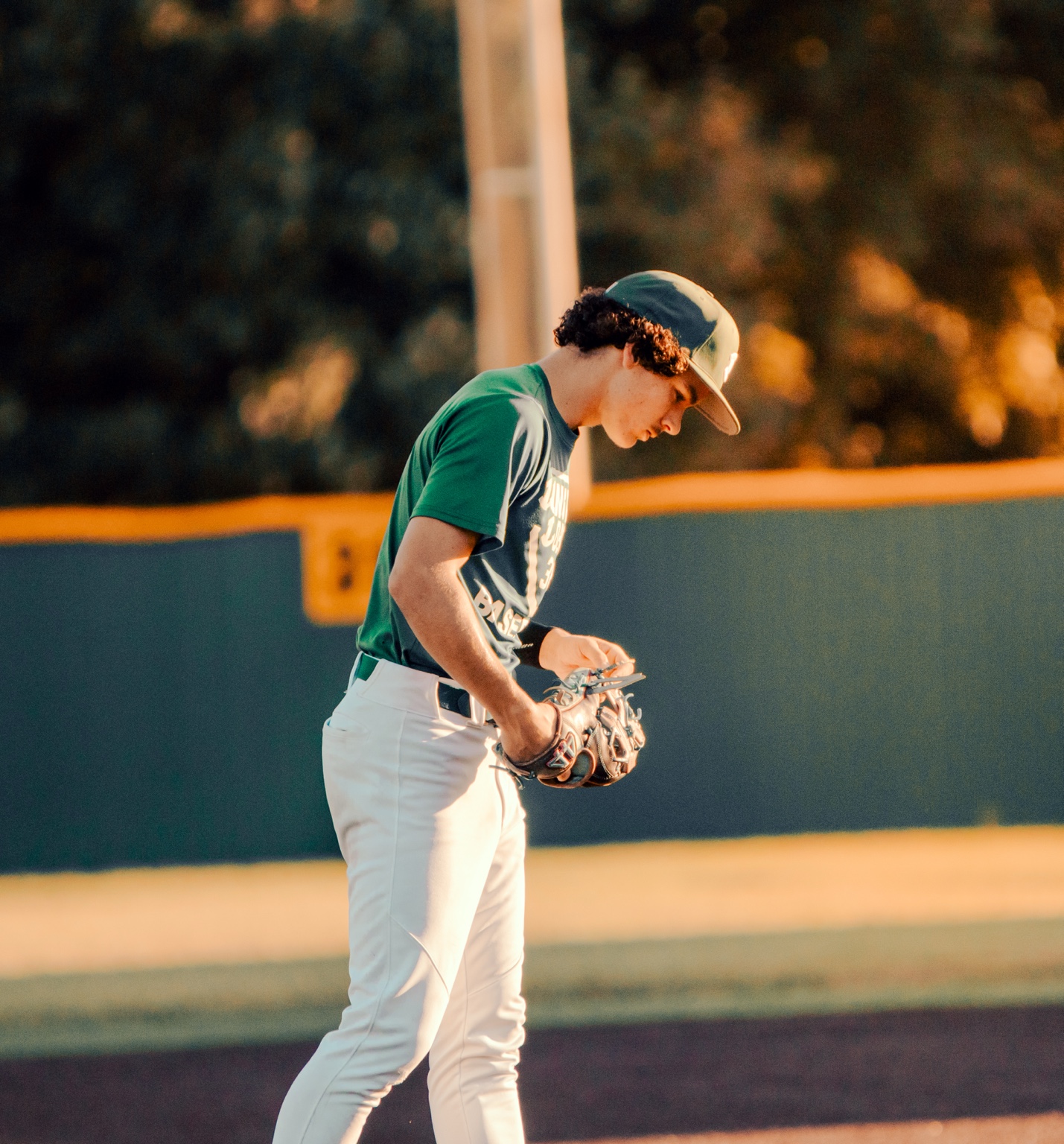 Baseball player in warm evening light