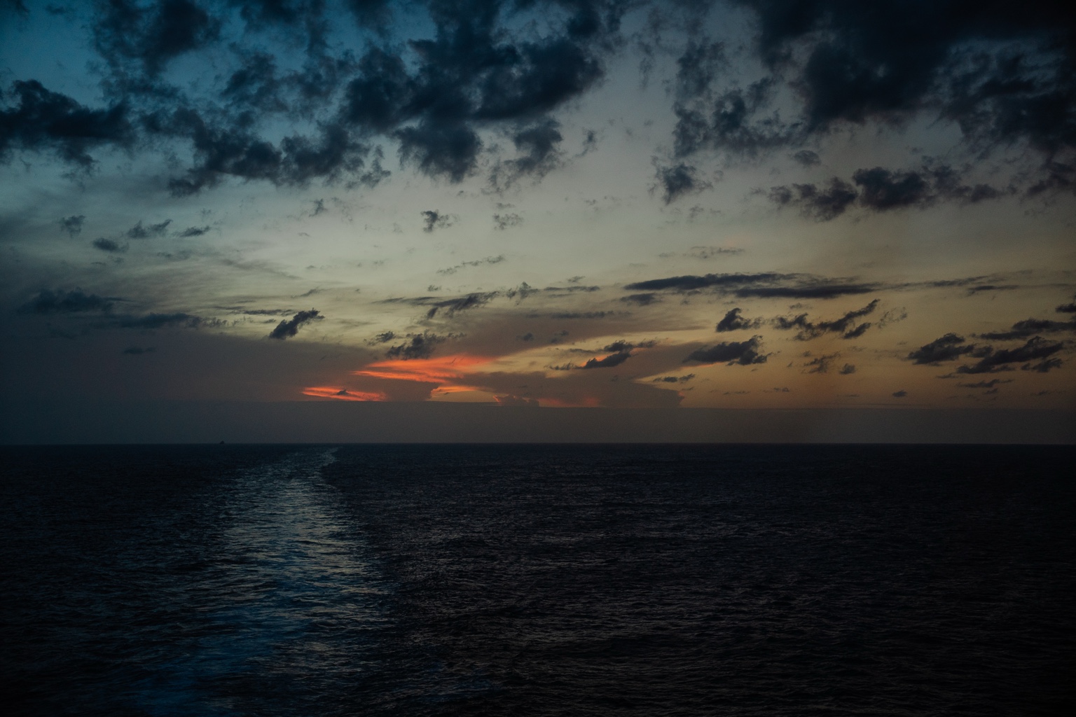 Dark blue ocean sunset